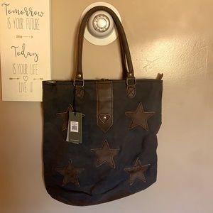Myra bag . Charcoal with brown stars